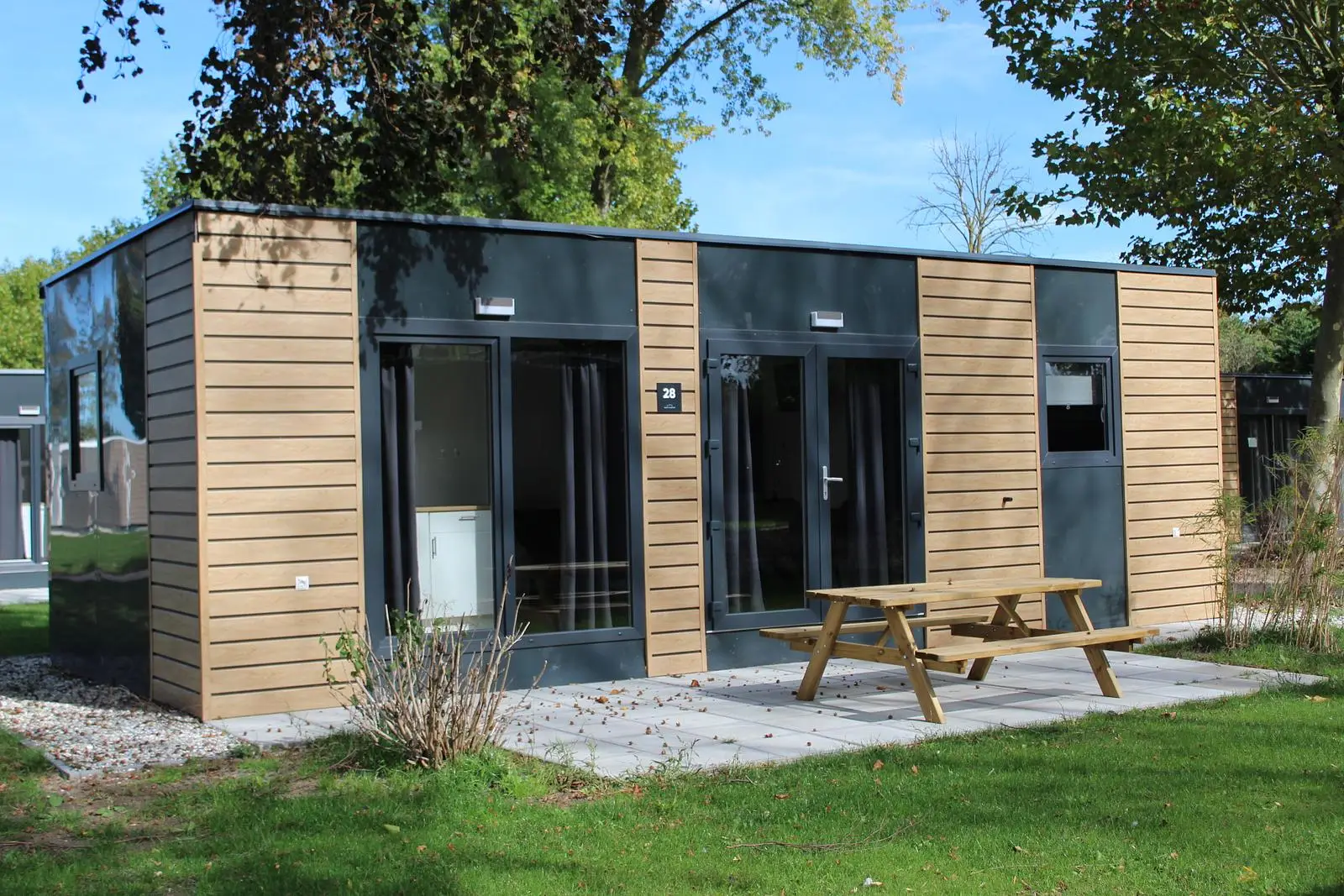 Buitenaanzicht van de Cube 4 persoons vakantiewoning op Resort de Betuwe