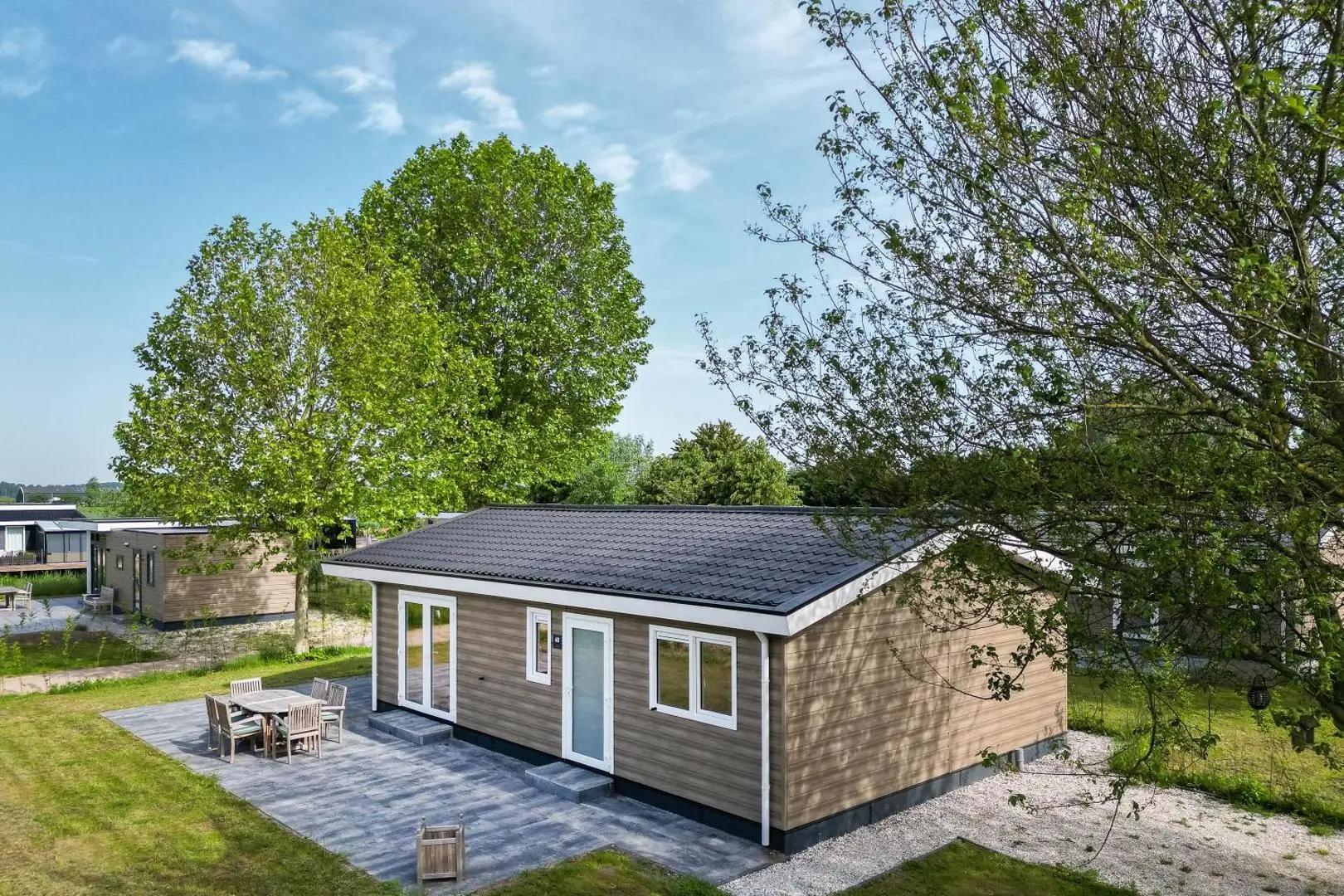 Buitenaanzicht van de Villa Riant 6 persoons vakantiewoning op Resort de Betuwe